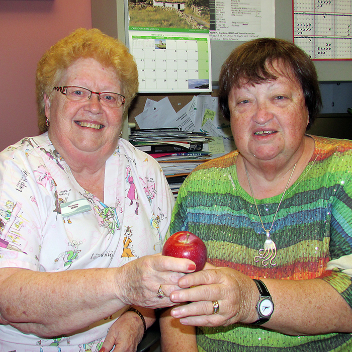 Registered Nurse Kathy Skinner and family physician Dr. Emer Dudley share a smile as they look back on a combined 100 years of medical service to the community. The two have worked together in private practice and at Sydenham District Hospital in Wallaceburg since Dr. Dudley emigrated from Ireland more than 30 years ago.