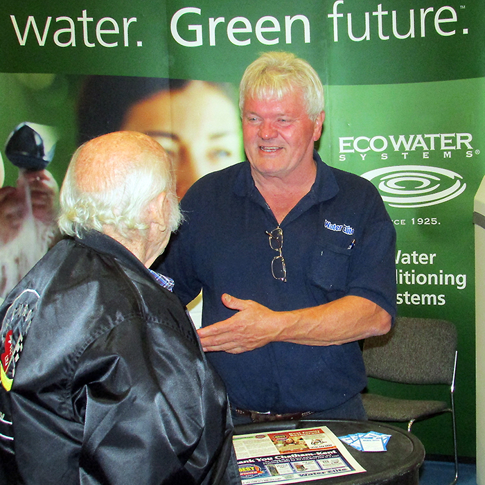 Water Elite’s Bob Kennedy discusses water filtration systems with Ken Osborne at the annual Chatham-Kent Home & Leisure Show Oct. 14.