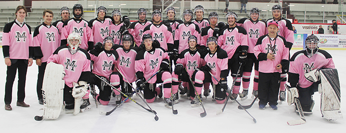 The Chatham Maroons show off their pink attire, part of Breast Cancer Awareness Night. The Oct. 16 event raised nearly $3,200 for charity.