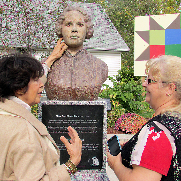 Commissioned to sculpt the bust of her great, great aunt Mary Ann Shadd (Carey), artist and sculptress Artis Lane visited her work of art which was installed in 2009 in the BME Freedom Park by the Chatham-Kent Black Historical Society and East Side Pride. Lane was joined Saturday by Marjorie Crew of East Side Pride during her tour of the park and house across the street where she once lived.