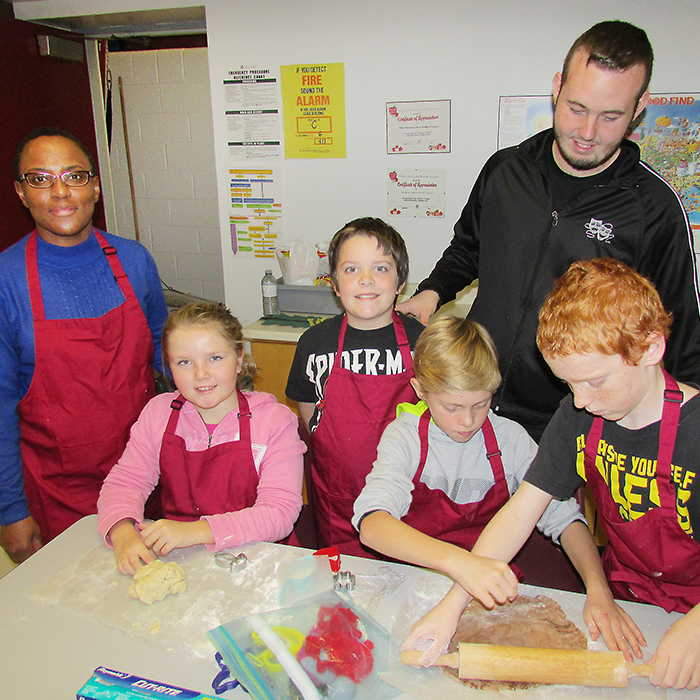 Thamesview Family Health Team nutritionist Coraine Wray, left, was at Victor Lauriston Public School Friday for the conclusion of an 8-week pilot project teaching Grade 5 and 6 students about proper nutrition. Making cookies with her are Dawson Hodges, co-op student from McGregor Secondary School, Mackenna Lopresti, Kaden Lovell (standing), Zachary Eldridge and Aidan Reeves.