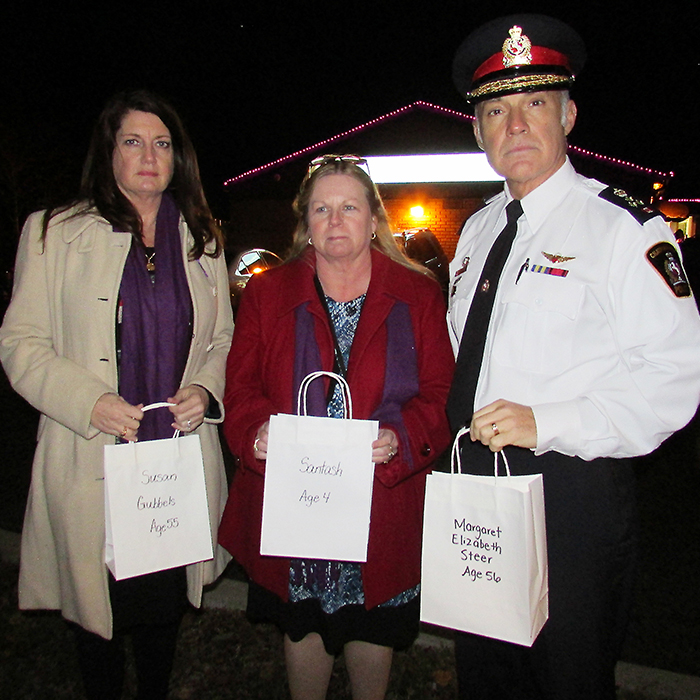 Honouring the memory of women and children who were killed by an intimate partner, Chatham-Kent Police Chief Gary Conn joined Chatham-Kent Women’s Centre executive director Karen Hunter, centre, and board chair Darlene Smith and community members in lighting a luminary recently to wrap up Violence Against Women Prevention Month in November.