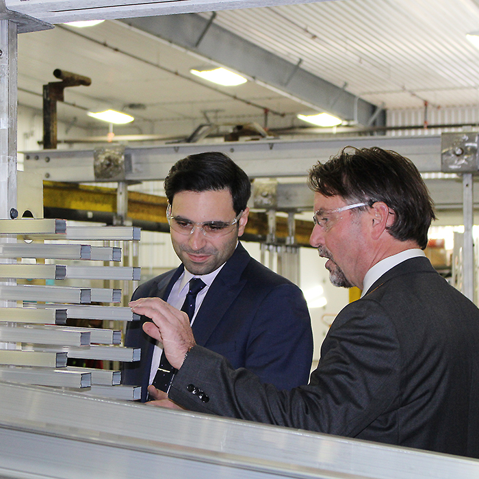 Peter Fragiskatos, Member of Parliament for London North Centre, and Mike Kilby, President of Dajcor Aluminum, tour the Chatham facility. The federal government announced Monday that it is investing up to $2.48 million for the company to increase production capacity.