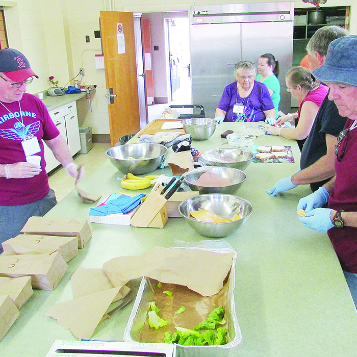 Volunteers at Vinnie’s Friday Lunch soup kitchen at the Spirit and Life Centre on Wellington Street in Chatham.