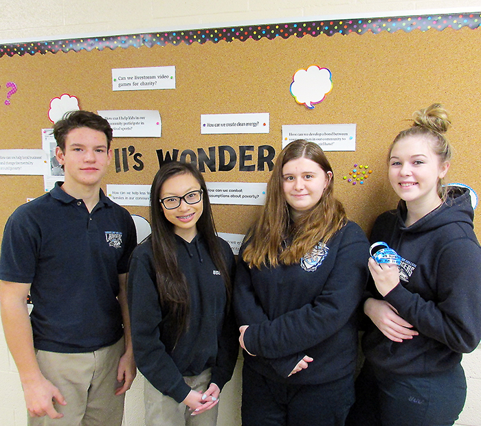 Grade 11 Ursuline College students Ben Herron, Vanna Nyugen, Kelsey Dodman and Makayla Boundy worked hard on projects to help different groups in our community, learning a different type of English skills while living their Catholic faith.