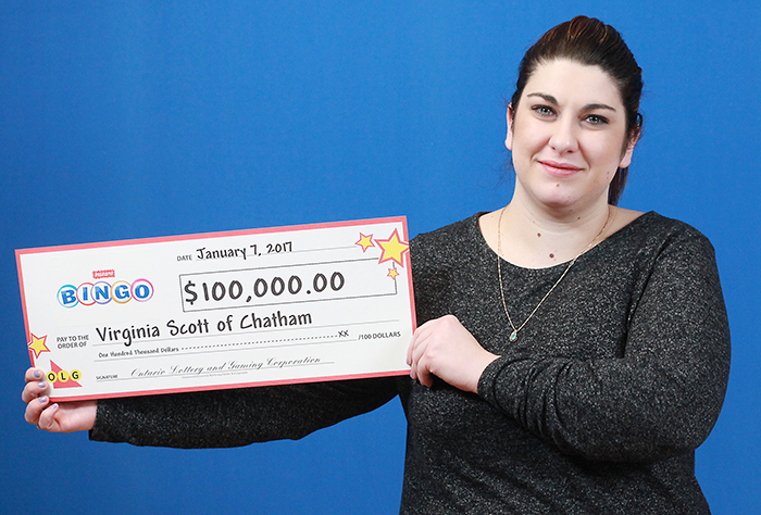 Chatham’s Virginia Scott shows off her big payout after winning big on a scratch ticket recently.