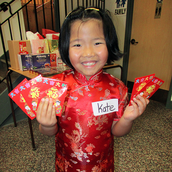 Kate Kuri, 8, of Chatham took part the Chinese New Year celebration at Blessed Sacrament Church on Sunday. The community took part with food, entertainment and games at the event put on by the Chatham-Kent Chinese Association.