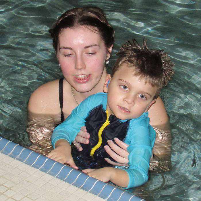 Luca Leggiero, 4, works hard at his swimming skills in the Adapted Swim program at the Chatham-Kent Children’s Treatment Centre under the guidance of student Paige Glasier. The centre was given a $7,500 donation from the Goodlife Kids Foundation to help with the costs of recreation programs like the Adapted Swim.
