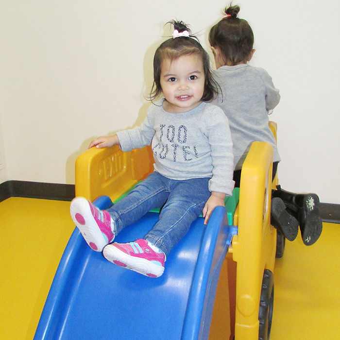 Lily Parayno, 16 months, plays on the bus/slide at the Chatham-Kent YMCA with her sister Mia, 2, during the Strong Kids campaign announcement Feb. 16. Last year’s campaign raised more than $93,000 and helped more than 1,000 people gain access to the Y’s programs where they might not have had the financial ability otherwise.
