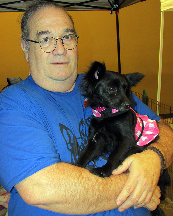 Volunteer with the Rat Terrier Rescue, Bill Ziobroski of Brampton, holds a recent rescue and adoptee, Tara at the Southwestern Ontario Pet Expo held on the weekend at the John D. Bradley Centre in Chatham.