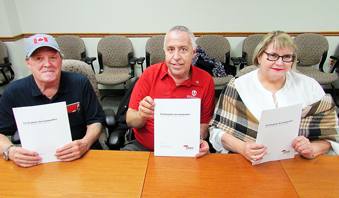 Chatham-Kent Health Coalition member Dave Hebblethwaite, left, joins co-chairs Rick MacLean and Shirley Roebuck at a press conference Monday releasing the results of the community health-care survey they conducted in Chatham-Kent.