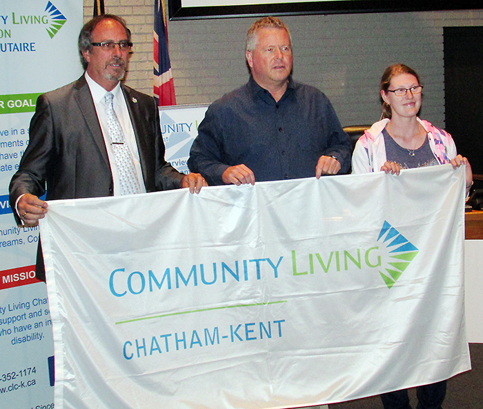 Chatham-Kent Mayor Randy Hope, Community Living Chatham-Kent executive director Ron Coristine, and Community Living C-K member Samantha Johnson celebrate Community Living Month recently.