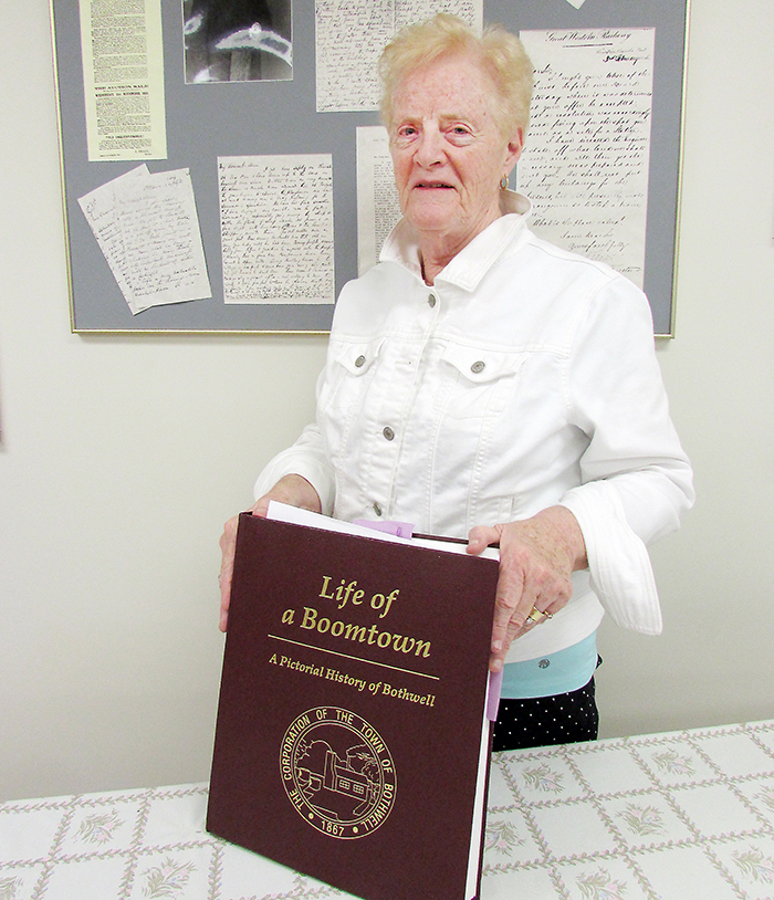 Marion Matt, former reeve of Bothwell and town historian, is part of the 150th anniversary celebration July 1. The town has lots of activities planned, including a look at the rich history of the town laid out in the seniors’ room at Town Hall. Matt is pictured with a panel she created about town founder and Father of Confederation George Brown, and the book she wrote in 2005 on the history of Bothwell.