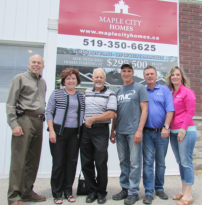 From left, Dr. Bruce Warwick, Diana and Gilles Michaud, Trevor Mailloux, Rob Nelson and Kim O’Rourke-Nelson are the faces of Maple City Homes, a new homebuilder in Chatham-Kent. The company, committed to buying local and building local, is set to break ground soon on a large project in the north side of Chatham.