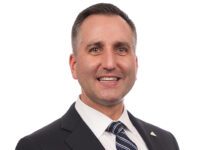 Ford shakes up cabinet, moves Jones